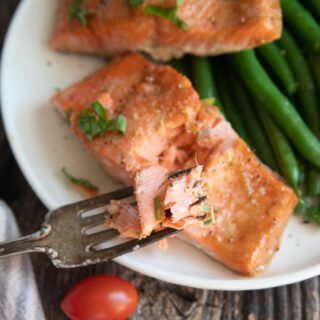 two air fryer salmon filets on a plate