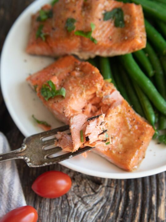 two air fryer salmon filets on a plate