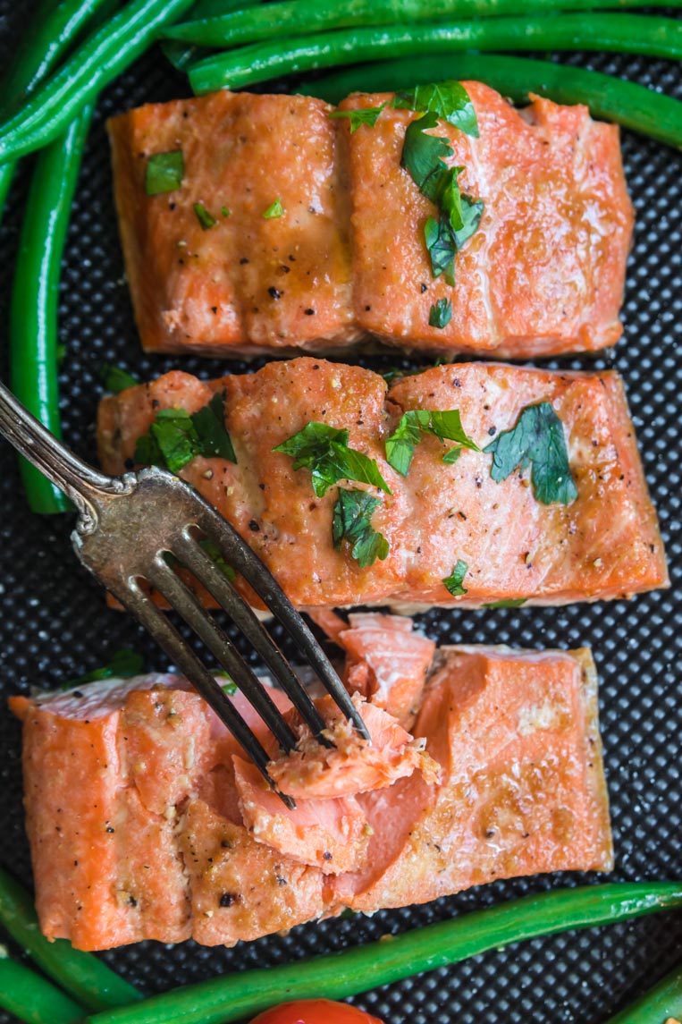 three salmon filets after cooking in the air fryer