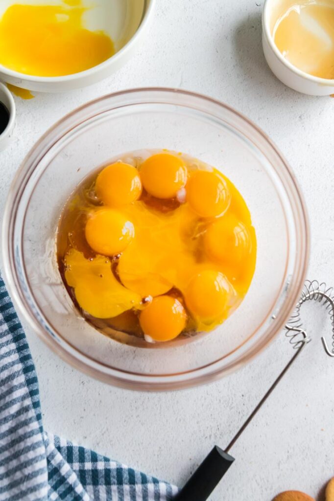 egg yolks and honey in a bowl