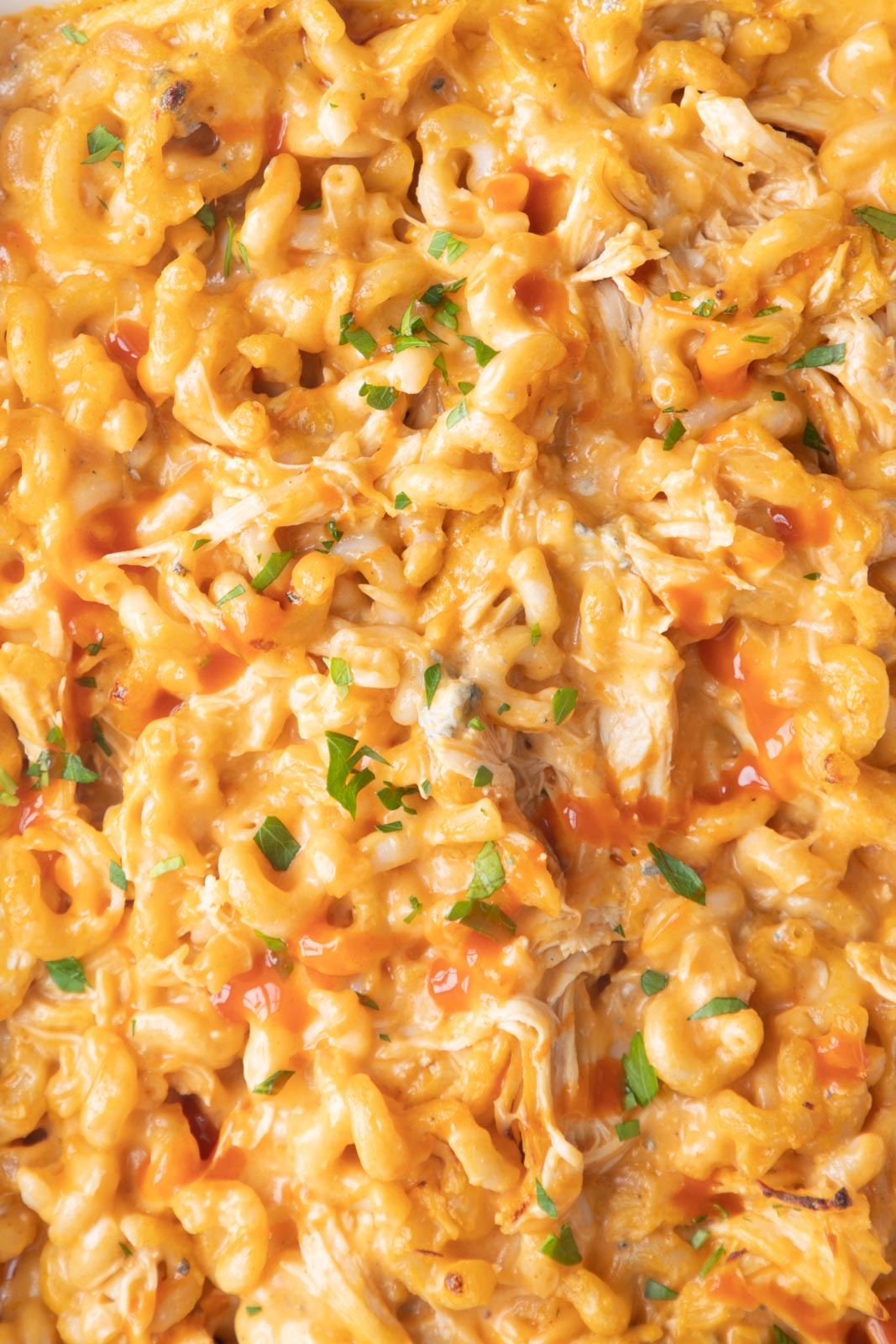 a close up of baked macaroni and cheese