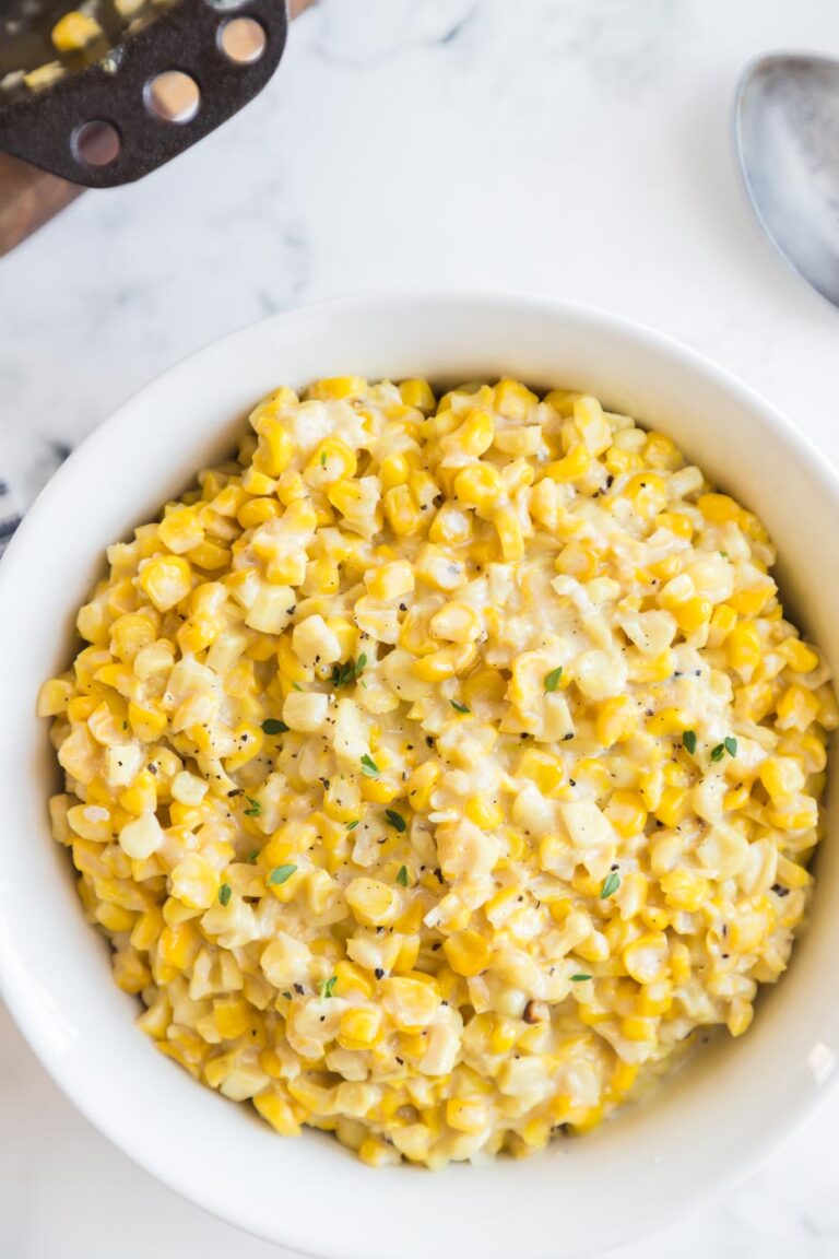 white bowl filled with freshly prepared creamed corn