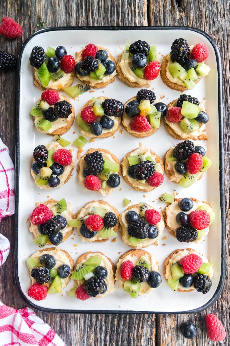 a large tray of fruit pizza cookies 