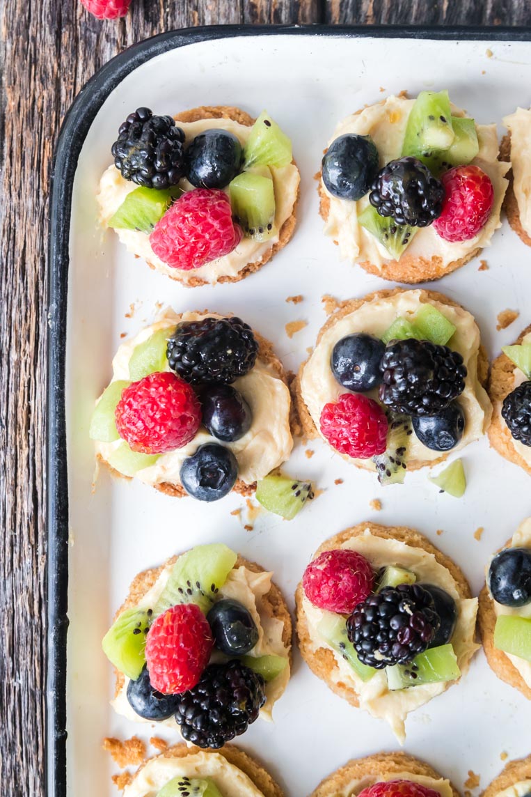 a tray of fruit pizza cookies on a tray 