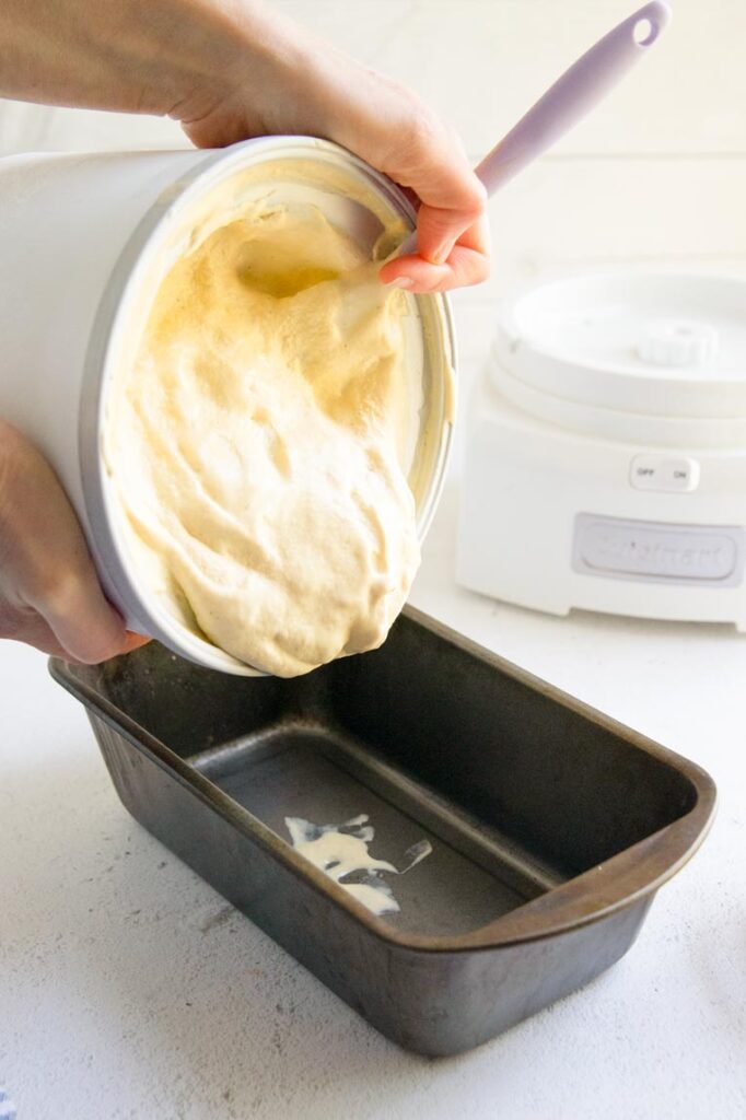 ice cream being transferred to a loaf pan to harden 
