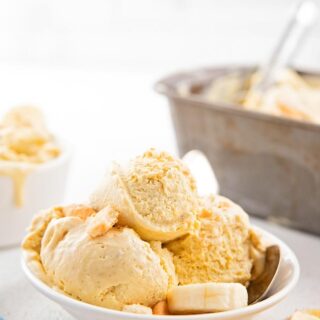 a bowl with three scoops of banana pudding ice cream