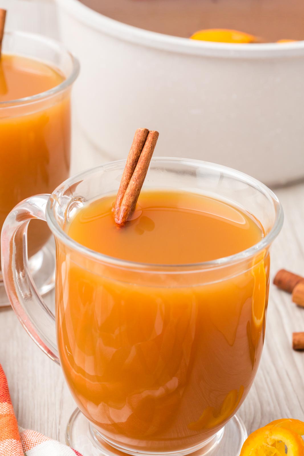 a mug of mulled cider on a table 