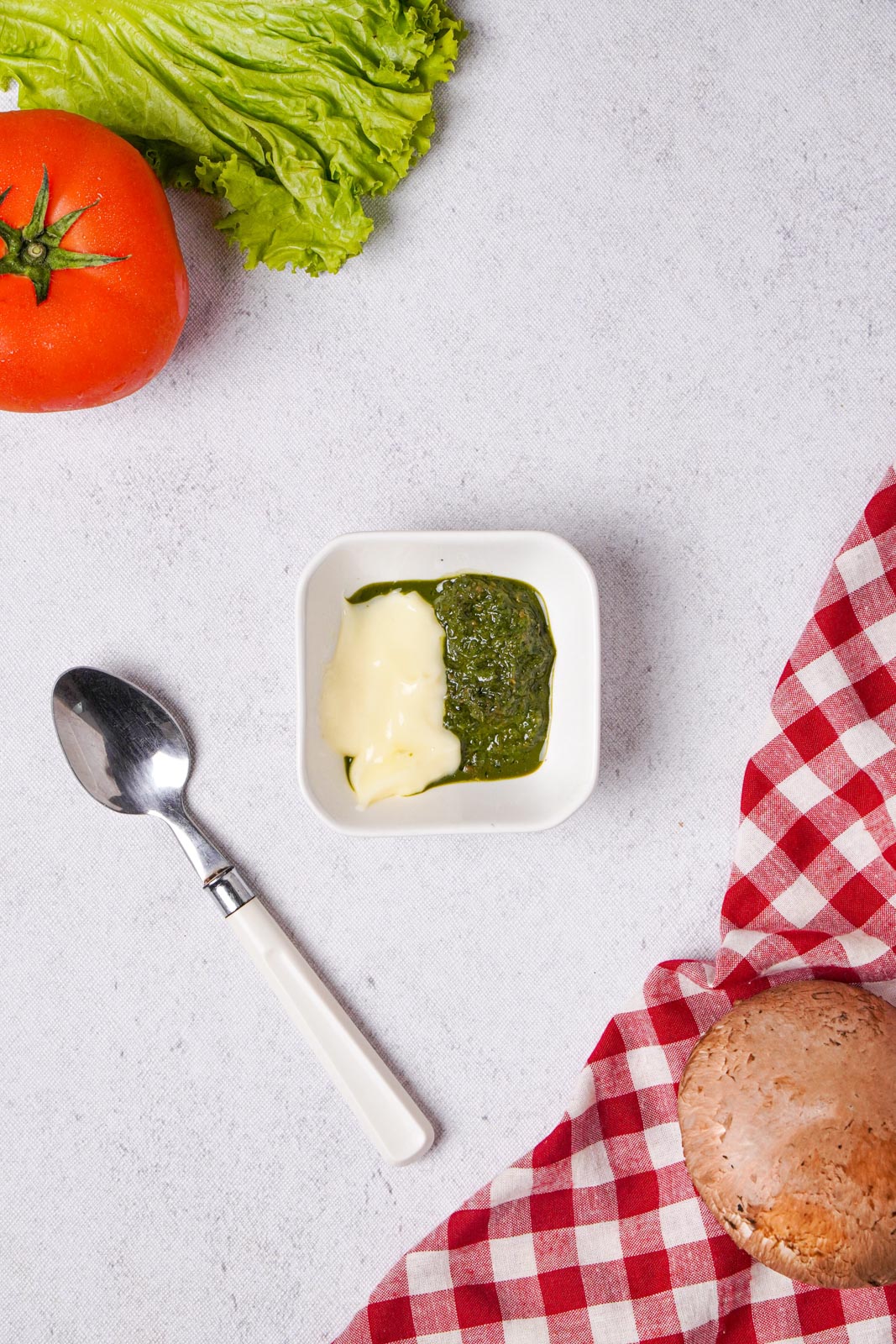 a bowl of pesto and mayonnaise in a bowl 