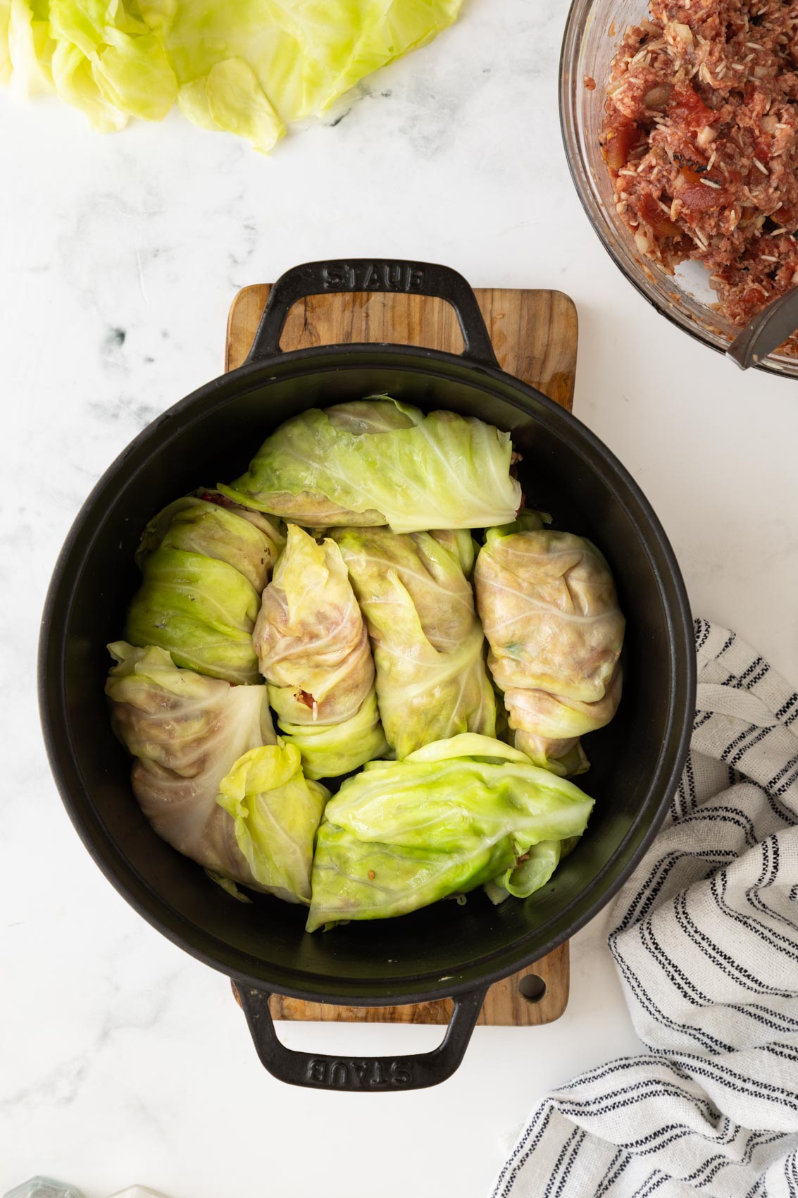 a pot with rolled cabbage inside