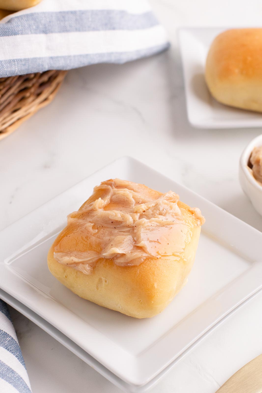 A Texas roadhouse roll smothered in honey cinnamon butter.
