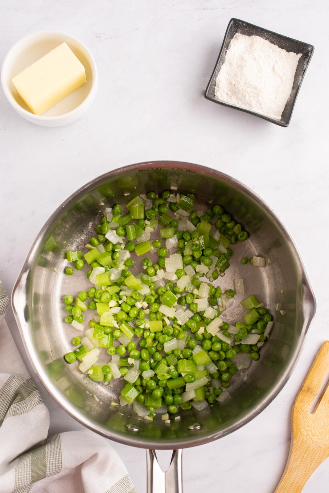 Sauteed onion, celery, garlic, and peas.