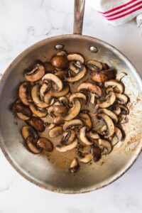 a skillet of sauteed mushrooms