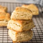 three biscuits stacked on a cooling rack