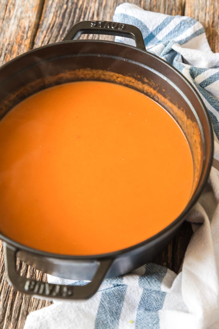 a pot of pureed creamy tomato bisque