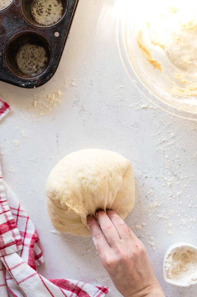 A ball of dough after kneading that is smoother and more firm. 
