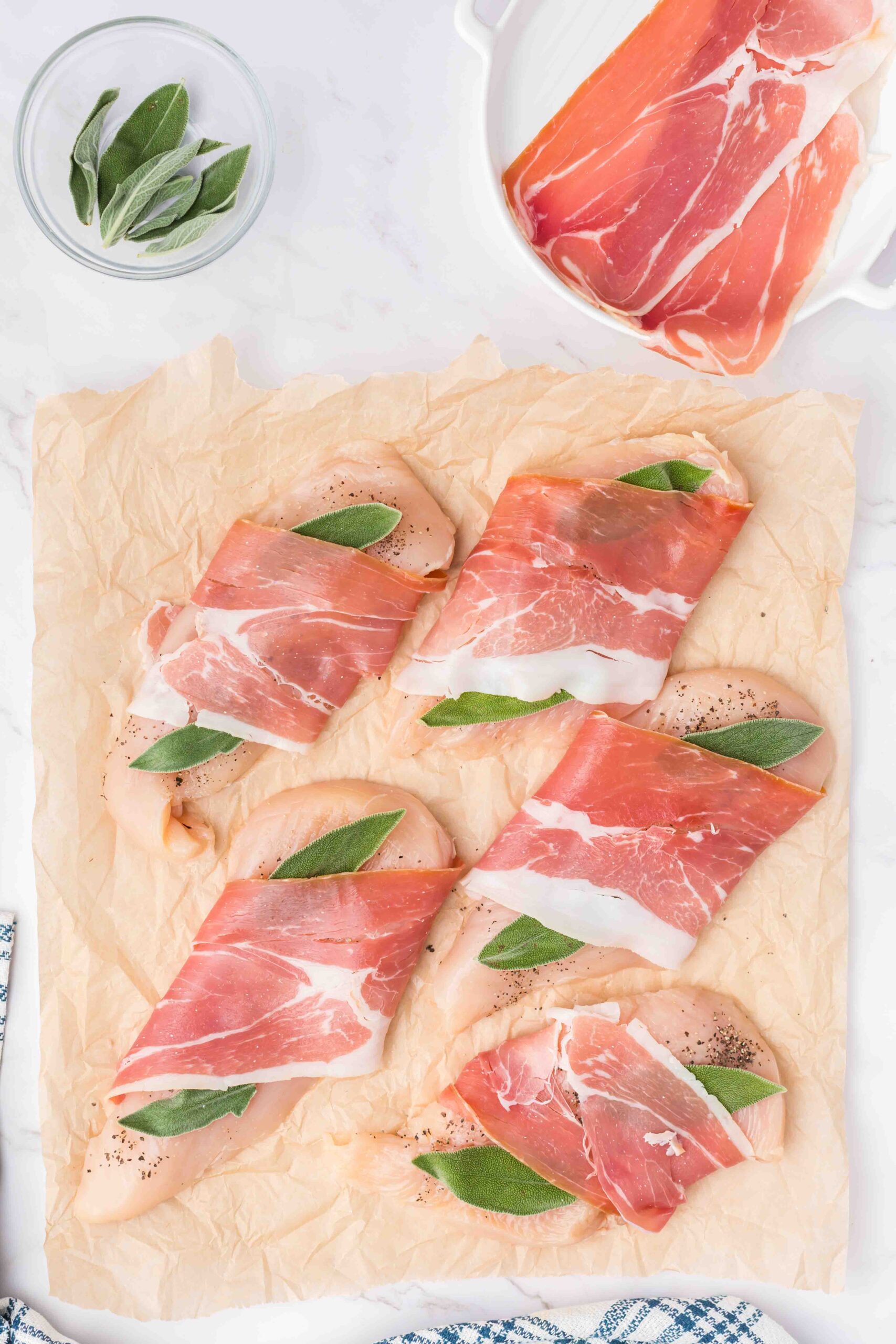 chicken and sage leaves wrapped in prosciutto 