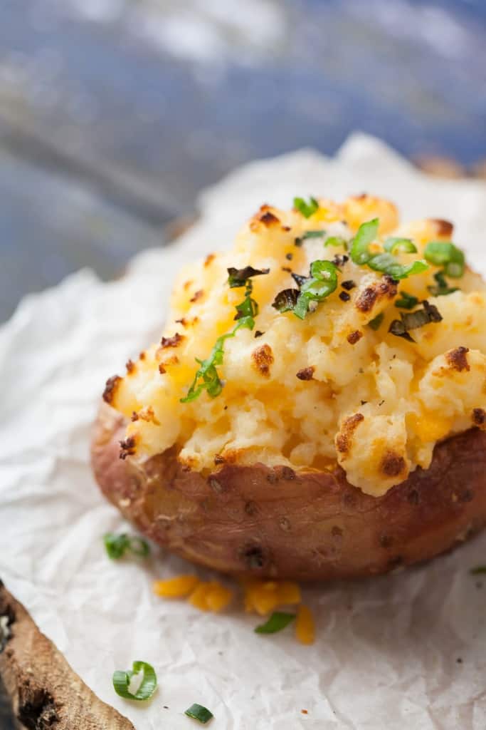 Piled high with cheesy filling, loaded overstuffed baked potatoes take a microwave shortcut and are ready in just 30 minutes. 