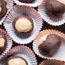 buckeye balls with peanut butter and chocolate in miniature cups
