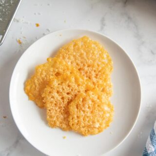 baked cheese crisps on a plate