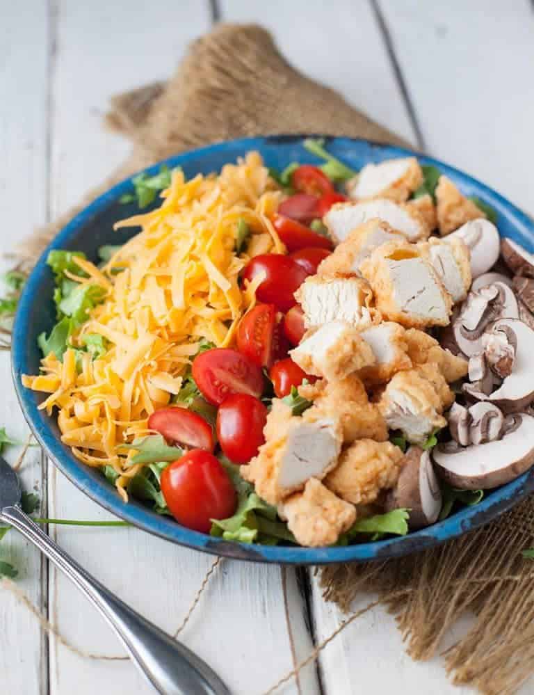 Okay sure, it's a little time consuming to make this when you fry your own chicken but you can use frozen pre-breaded tenders if you want to and toss together a super quick weeknight meal.