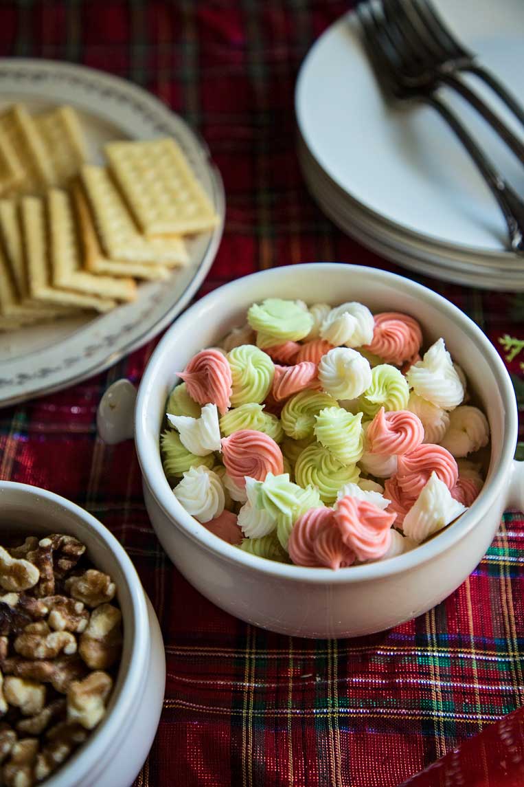 cream cheese mints in a bowl on a holiday table