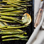 a sheet pan of roasted ginger and orange asparagus