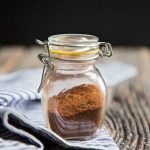 Homemade taco seasoning in a glass jar ready to be added to your ground beef.