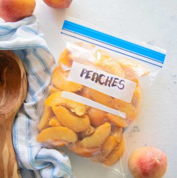 a freezer bag of peaches on a table