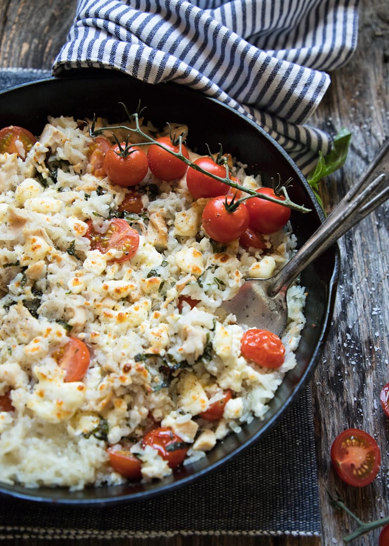 a big skillet of oven chicken risotto with roasted tomatoes
