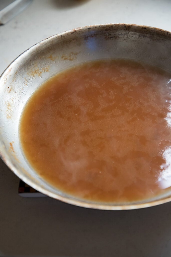 coffee added to pan drippings to be simmered and concentrated