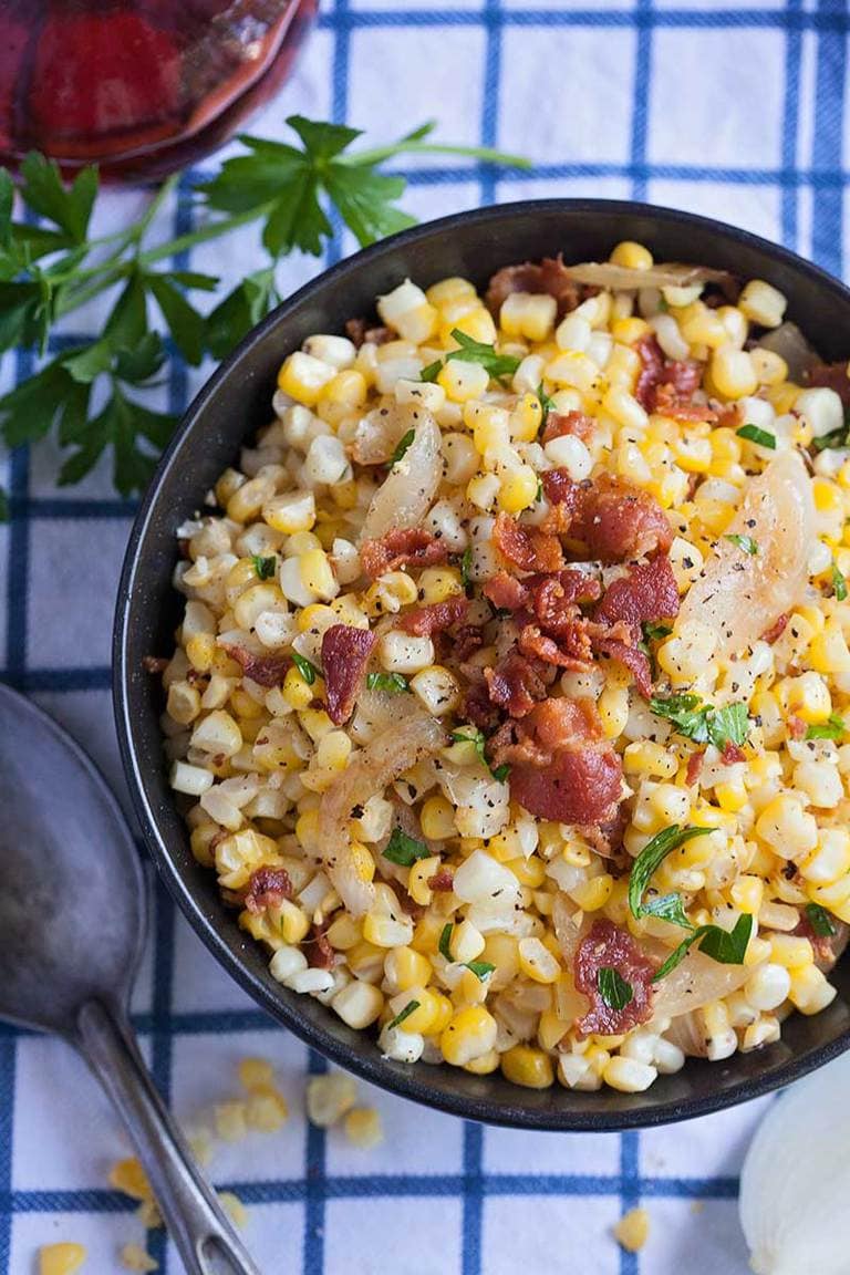 a bowl of oven roasted corn with bacon