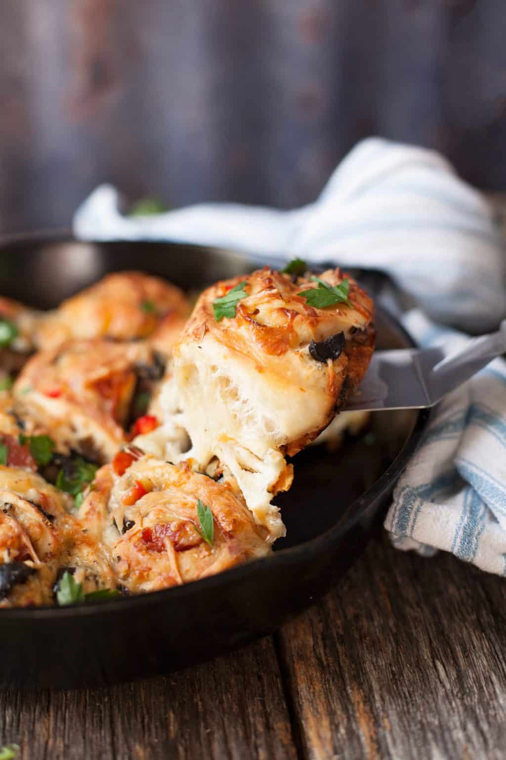 Need a freezer friendly, picky-eater customized dinner? You can do it all with skillet pizza rolls.